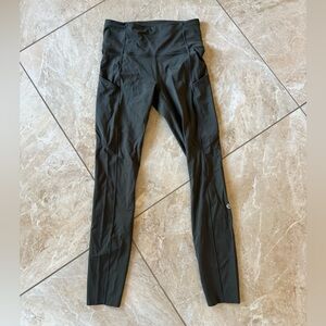 Lululemon leggings, 23” size 4, olive green with pockets.